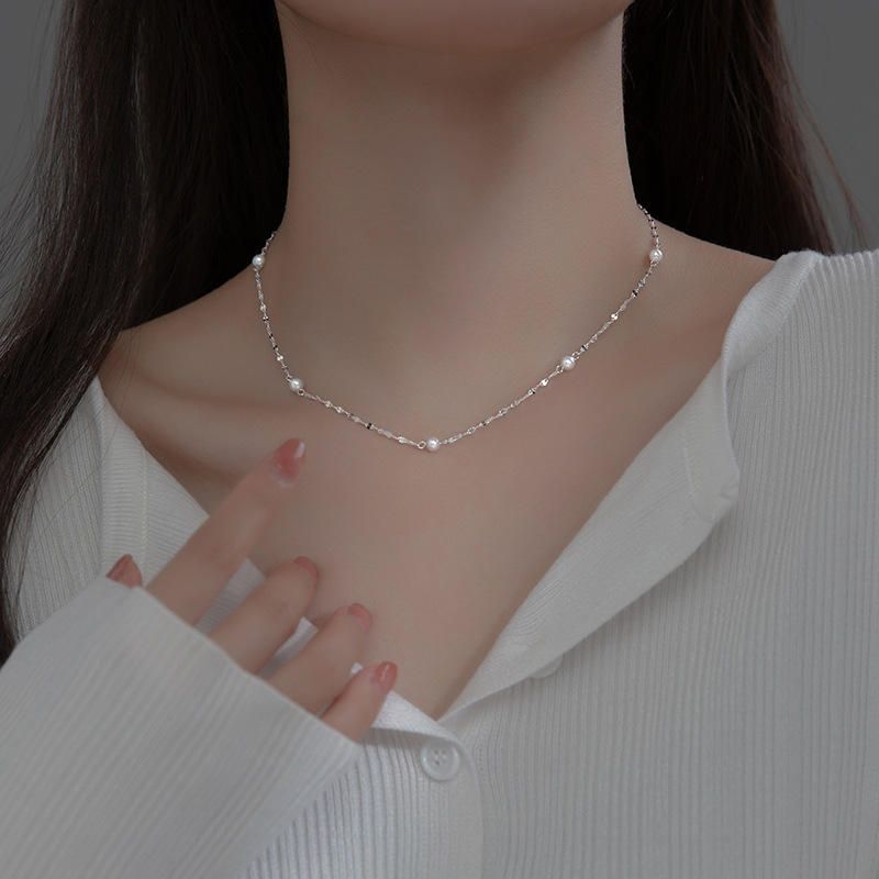 Halsketting in chokerstijl met glanzende kralen