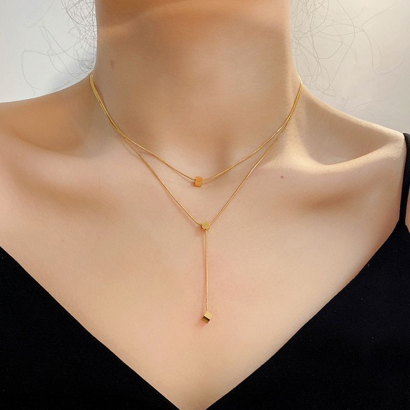 Dubbel geketende kubus kwast ketting