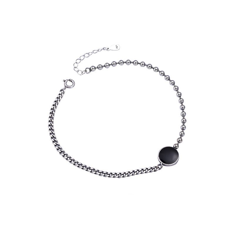 Klassieke zilveren armband met zwarte cirkel