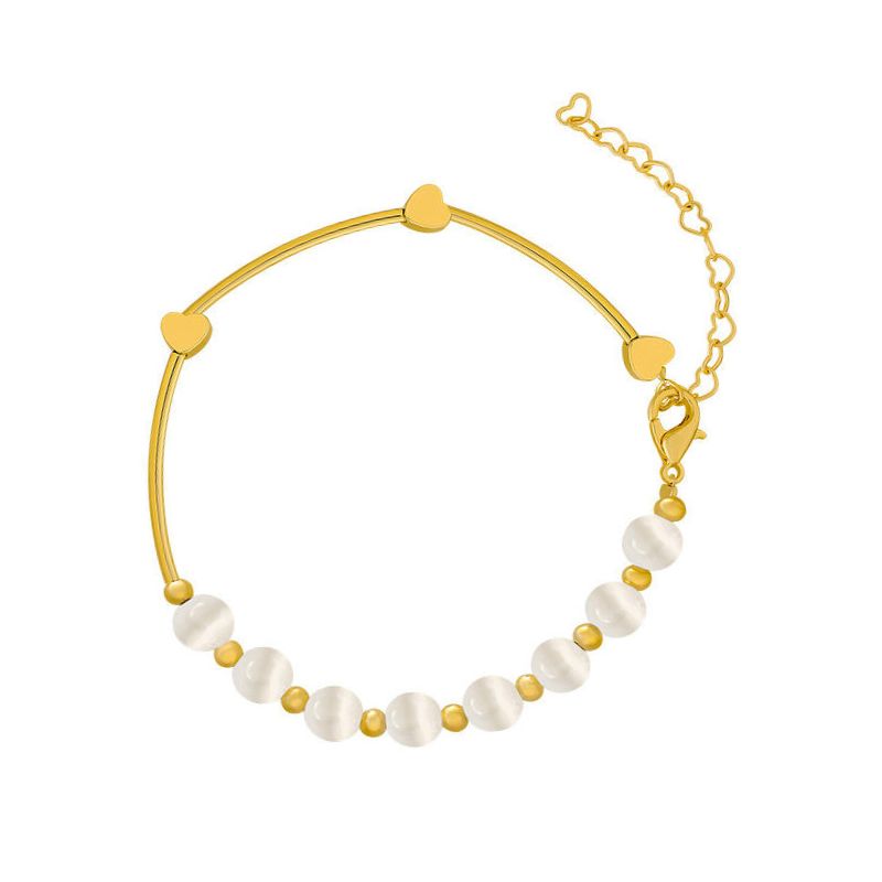 Gouden Armbanden Met Glanzende Witte Kralen