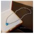 Koninklijke ketting met blauwe zirkoon hanger