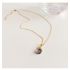 Gouden ketting met opaal charme hanger