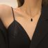Gouden Collier met klassieke zwarte hanger