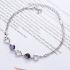 Stijlvolle Zilveren Armband Met Paarse Zirkonen & Hartpatroon