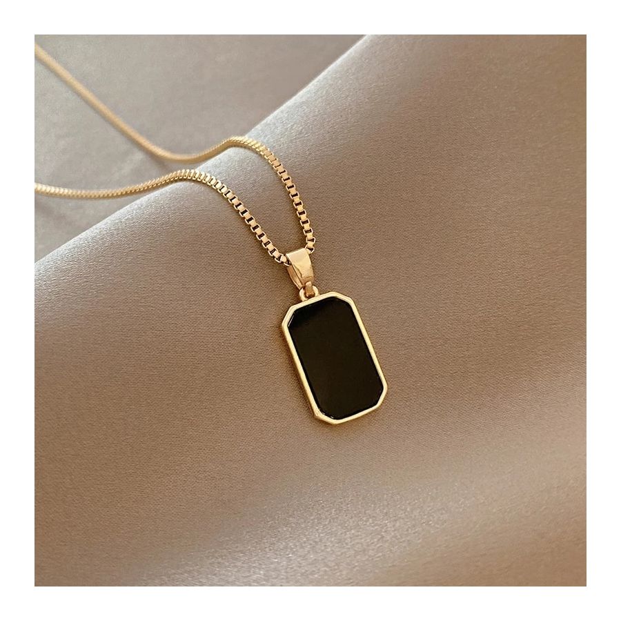 Golden Necklace with classic black pendant