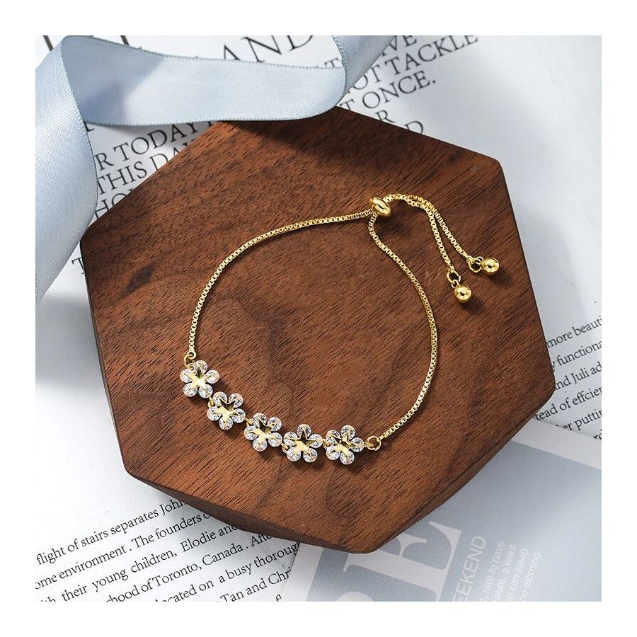 Golden Bracelets With Shiny Zircon Flowers