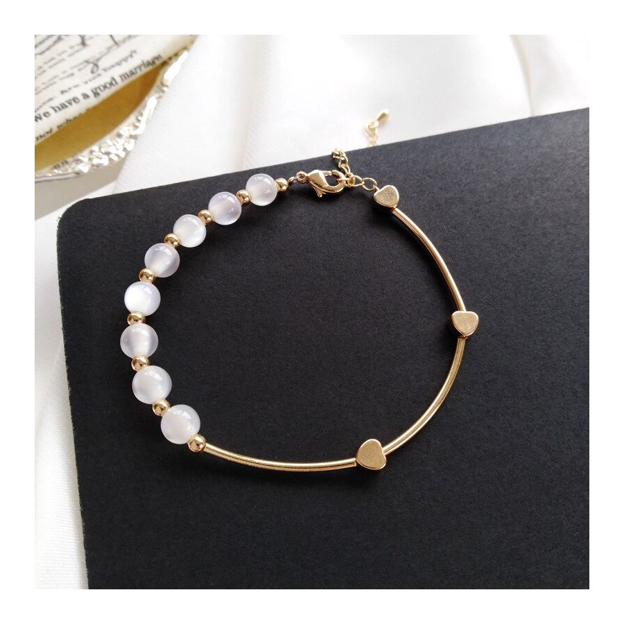 Golden Bracelets With Shiny White Beads
