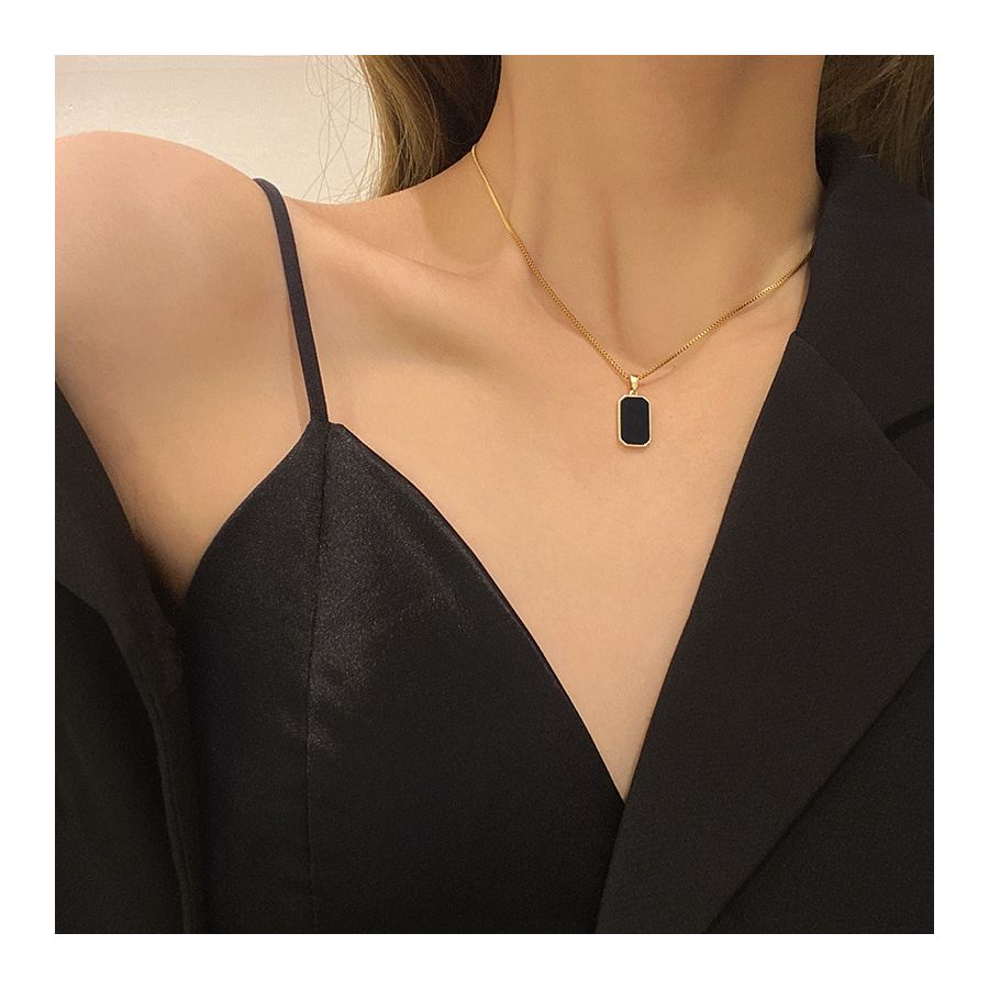 Golden Necklace with classic black pendant