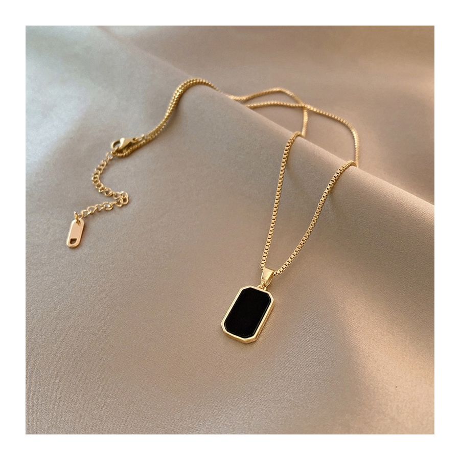 Golden Necklace with classic black pendant