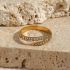 Golden Twisted Loop Over With Zircons Adjustable Ring
