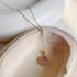 Luxurious Golden Necklace With Pink Zircon Pendant