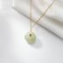 Golden Necklace With Green Rounded Stone Pendant