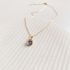 Gouden ketting met opaal charme hanger
