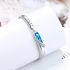 Silver Band Bracelet With Blue Zircon