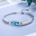 Silver Band Bracelet With Blue Zircon